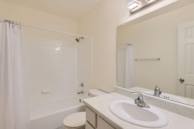 full bathroom with vanity, shower / tub combo with curtain, and toilet