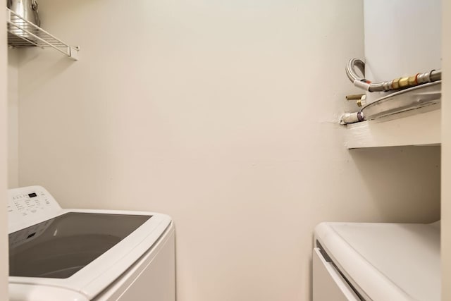 laundry room with washer and clothes dryer