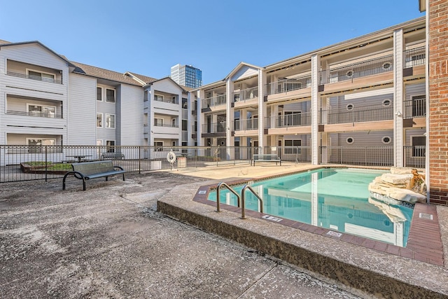 view of pool featuring a patio area