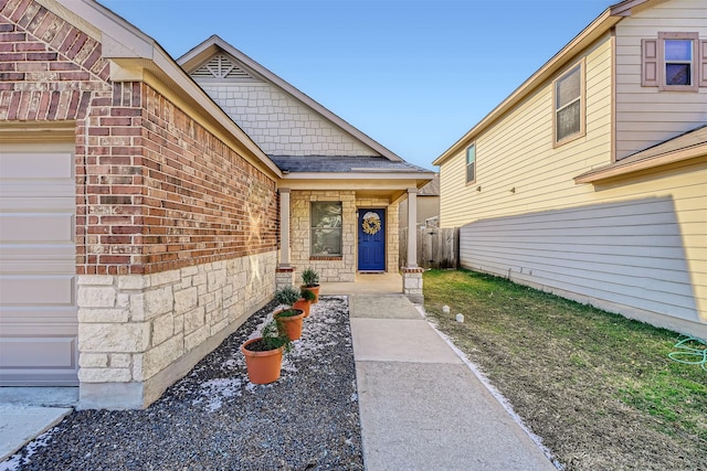 entrance to property featuring a garage