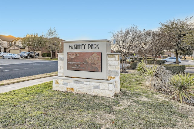 view of community sign