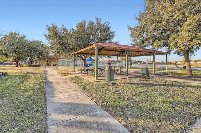 view of property's community with a gazebo and a lawn