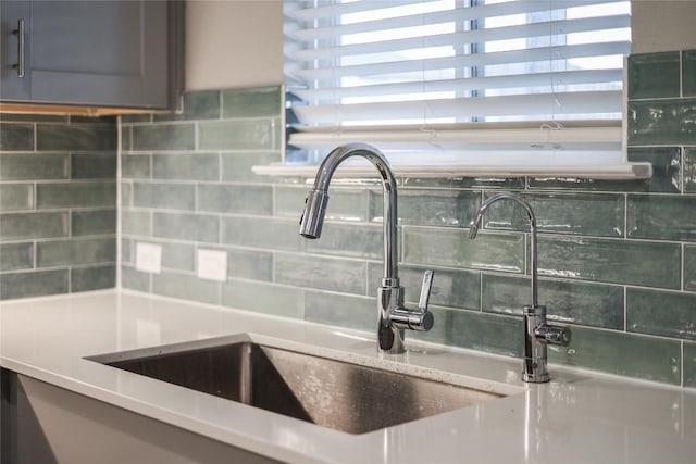 7001 Lewiston Way, Austin, TX 78724 - kitchen view of decorative backsplash and a sink