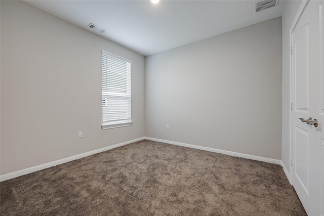 unfurnished room featuring carpet flooring