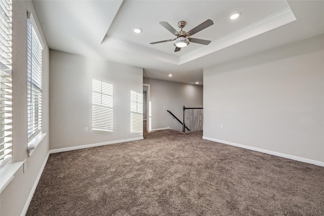 7001 Lewiston Way, Austin, TX 78724 - unfurnished room with a raised ceiling, carpet, ceiling fan, recessed lighting, and ornamental molding