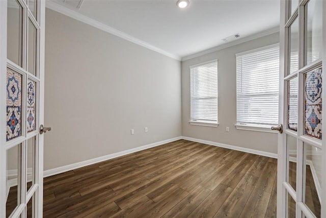 7001 Lewiston Way, Austin, TX 78724 - spare room featuring dark wood-style floors and ornamental molding