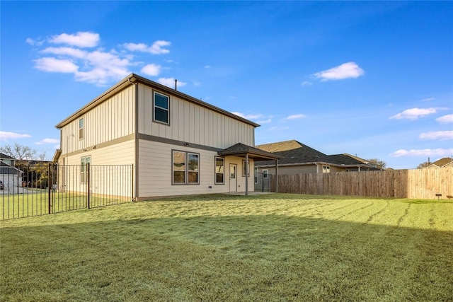 7001 Lewiston Way, Austin, TX 78724 - rear view of property with a fenced backyard and board and batten siding