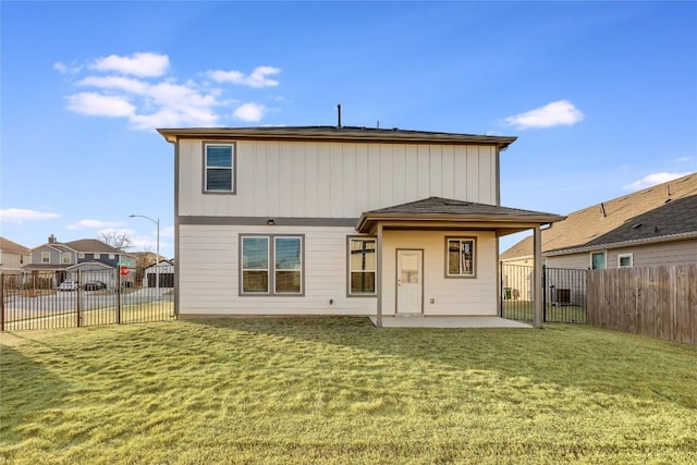 7001 Lewiston Way, Austin, TX 78724 - rear view of property with a patio area and a fenced backyard