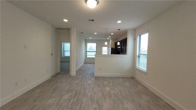 12320 Maypole Bnd, Austin, TX 78717 - spare room featuring baseboards, light wood-style floors, and recessed lighting