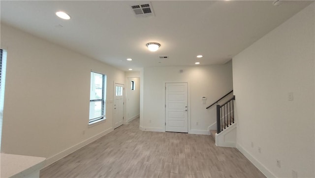 12320 Maypole Bnd, Austin, TX 78717 - spare room featuring stairway, recessed lighting, light wood-style floors, and baseboards