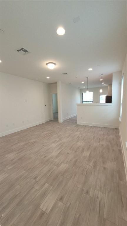 12320 Maypole Bnd, Austin, TX 78717 - spare room featuring light wood-type flooring, baseboards, and recessed lighting