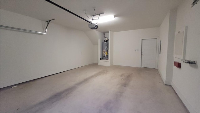 12320 Maypole Bnd, Austin, TX 78717 - garage with a garage door opener and gas water heater