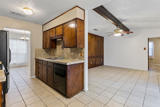 kitchen featuring sink, a wealth of natural light, lofted ceiling with beams, and dishwasher