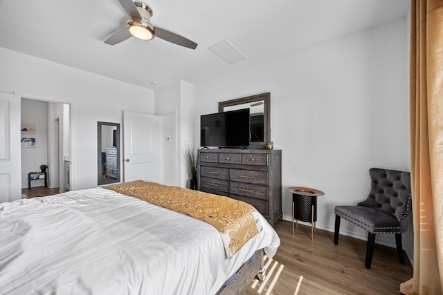 bedroom with hardwood / wood-style flooring and ceiling fan