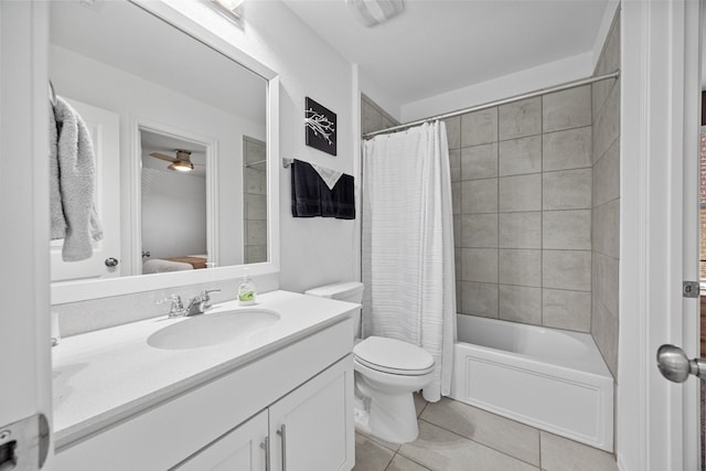 full bathroom featuring vanity, tile patterned floors, toilet, and shower / bath combo with shower curtain