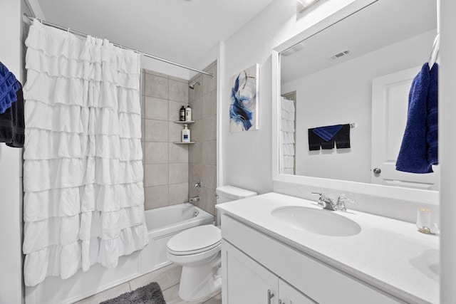 full bathroom featuring tile patterned flooring, shower / bath combo, vanity, and toilet