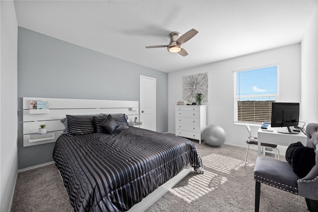 bedroom with ceiling fan and carpet floors