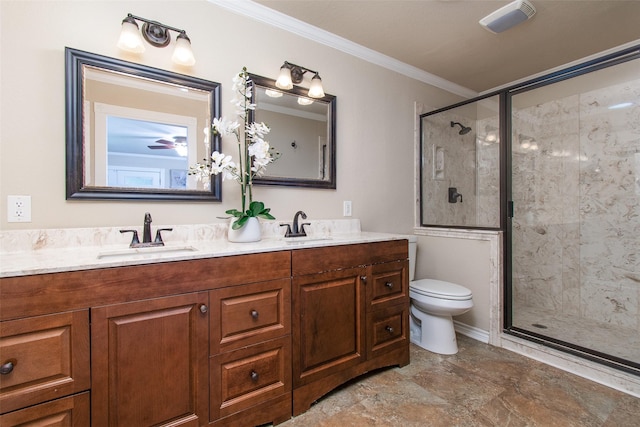 bathroom with ornamental molding, toilet, an enclosed shower, and vanity