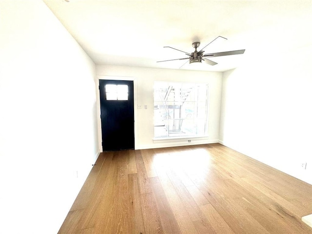 entrance foyer with light hardwood / wood-style floors and ceiling fan