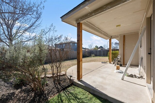 1016 Flanagan Dr, Leander, TX 78641 - fenced backyard featuring a patio area