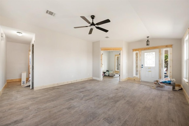 1016 Flanagan Dr, Leander, TX 78641 - entryway featuring wood finished floors, ceiling fan, and lofted ceiling