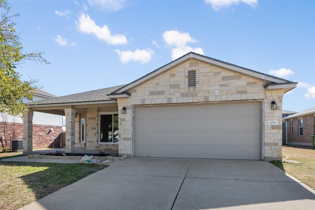 ranch-style house featuring a garage