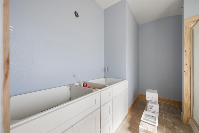 bathroom with tile patterned flooring