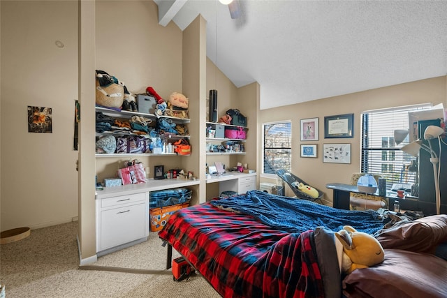 carpeted bedroom with vaulted ceiling and ceiling fan