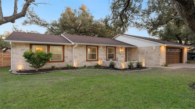 single story home with a garage and a front yard