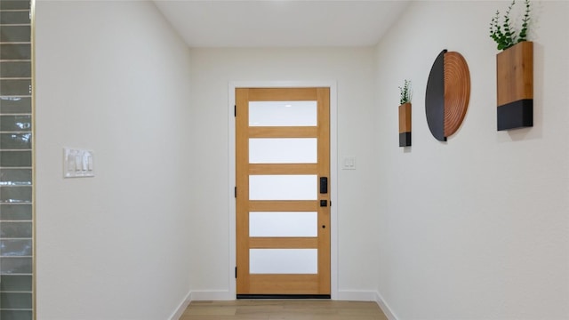 doorway featuring light wood-type flooring