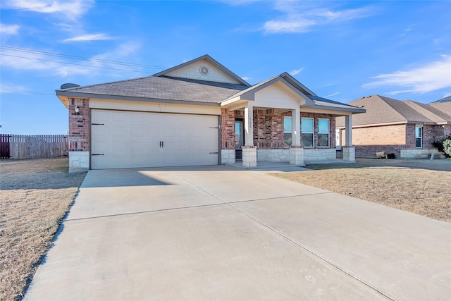 single story home with a garage and a porch