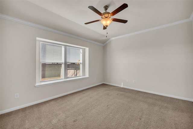 carpeted empty room with crown molding, ceiling fan, and lofted ceiling