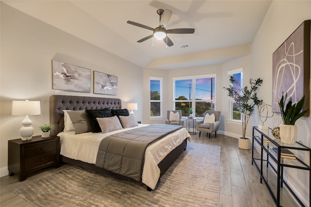 125 Serene Hilltop Cir, Austin, TX 78738 - bedroom with wood finished floors, baseboards, a ceiling fan, and lofted ceiling