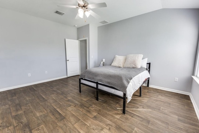 bedroom featuring lofted ceiling, dark wood-type flooring, and ceiling fan