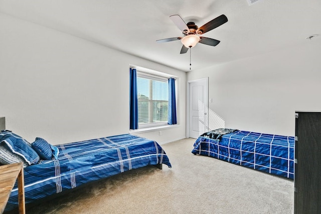 1712 Uhland Dr, Leander, TX 78641 - carpeted bedroom with ceiling fan and baseboards