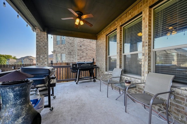 view of patio / terrace featuring a grill and ceiling fan