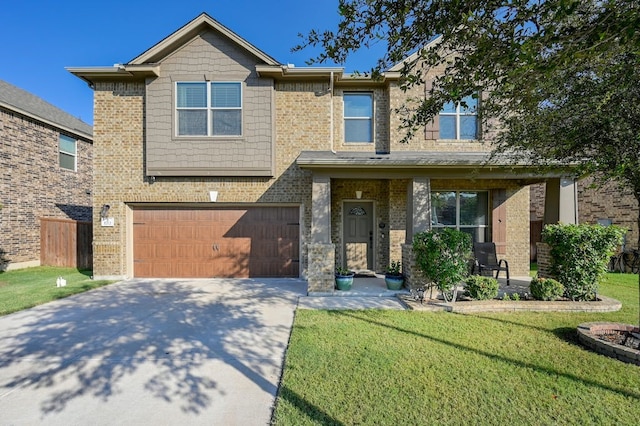 view of front facade featuring a garage and a front lawn