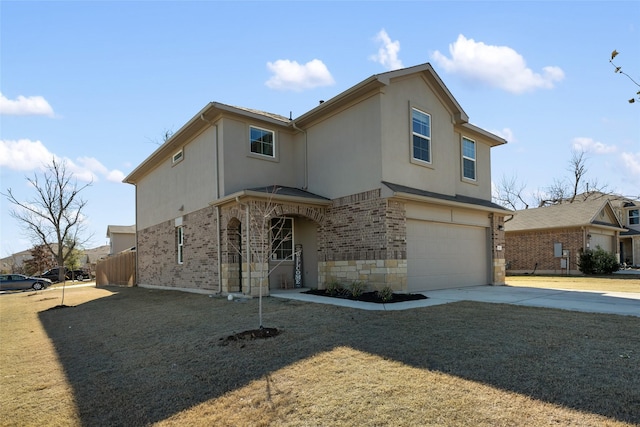 view of front of property with a garage and a front lawn