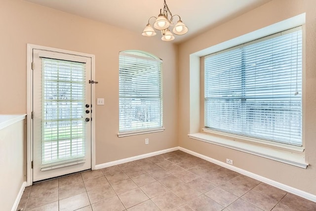 4312 Clear Meadow Pl, Round Rock, TX 78665 - entryway with a chandelier, light tile patterned floors, and baseboards