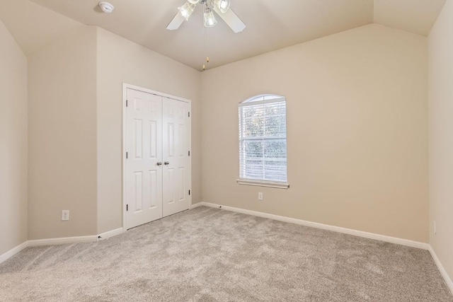 4312 Clear Meadow Pl, Round Rock, TX 78665 - unfurnished bedroom featuring light carpet, baseboards, a closet, and lofted ceiling