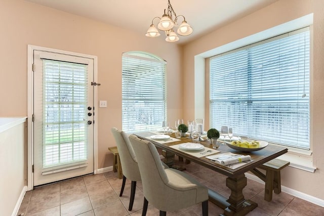4312 Clear Meadow Pl, Round Rock, TX 78665 - dining room with a chandelier, plenty of natural light, and baseboards