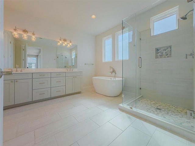 bathroom with vanity, separate shower and tub, and tile patterned floors