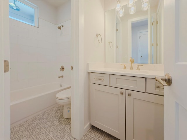 full bathroom featuring tile patterned flooring, vanity, tub / shower combination, and toilet