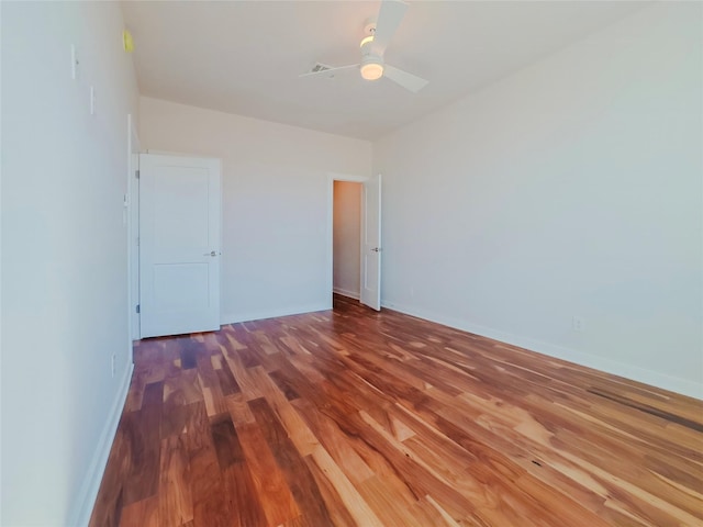 unfurnished bedroom featuring ceiling fan and hardwood / wood-style floors