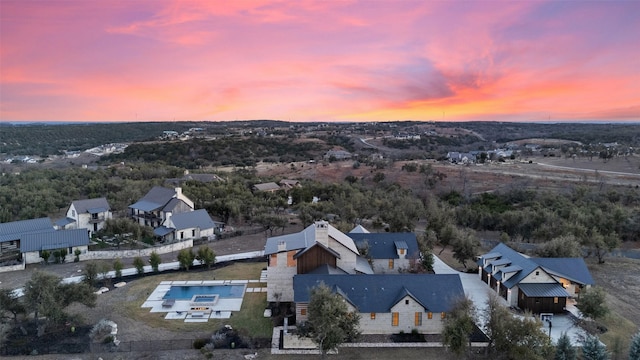 view of aerial view at dusk