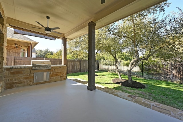 view of patio / terrace featuring exterior kitchen, grilling area, and ceiling fan