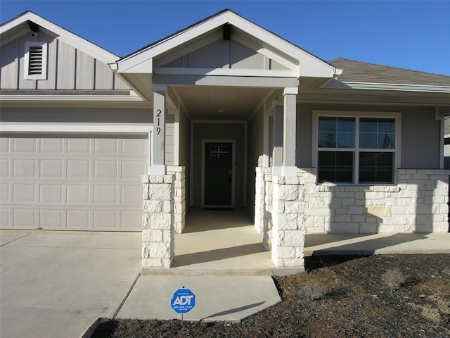 entrance to property with a garage