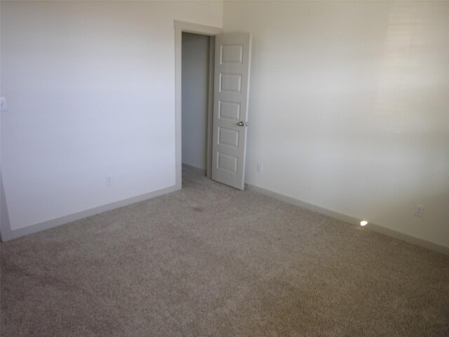 empty room with carpet floors