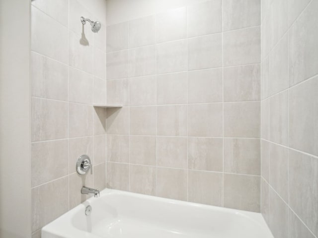 full bath featuring shower / tub combination