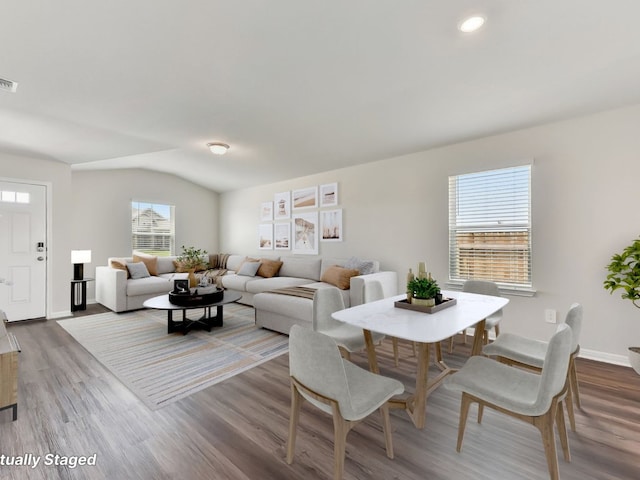 249 Boatright Blvd, Jarrell, TX 76537 - living room featuring wood finished floors, baseboards, recessed lighting, and vaulted ceiling